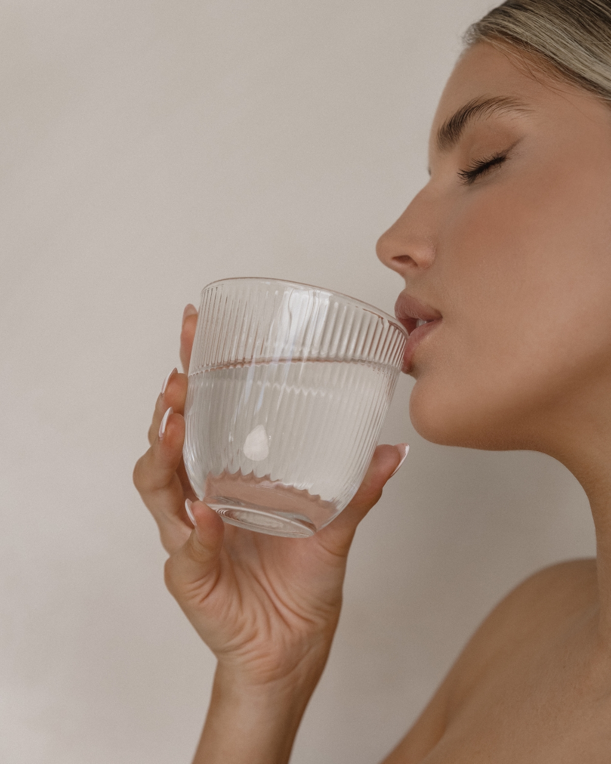 Woman drinking from glass